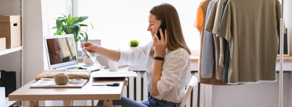 Woman working on a custom merchandise business